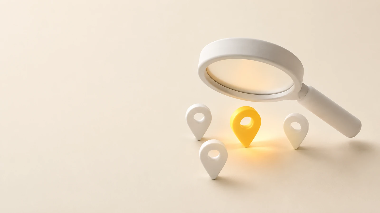 Magnifying glass over a glowing yellow map pin among white pins.